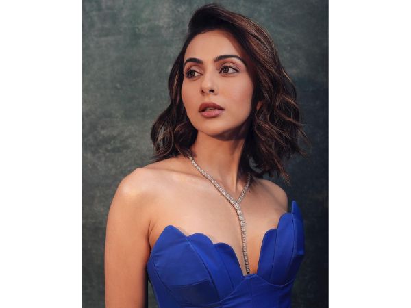 Actress Rakul Preet Singh Glamorous Stills In Blue Color Side Slit Dress