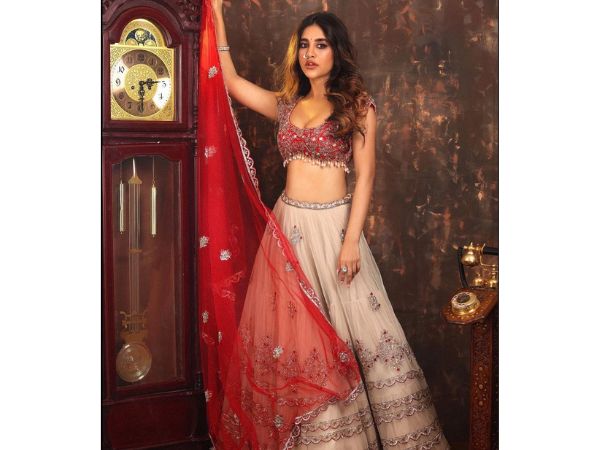 Actress Nabha Natesh Mesmerizing Stills In Red Lehenga
