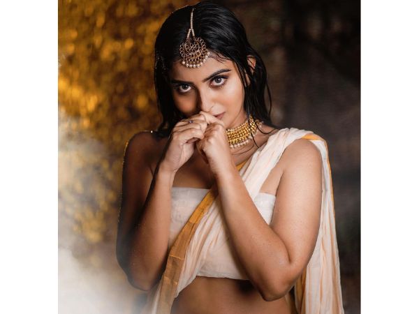 Actress Ananya Nagalla Glamorous Stills In Wet White Saree