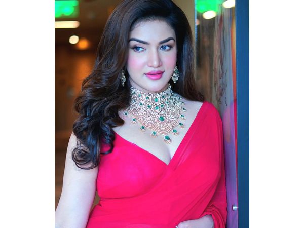 Actress Honey Rose Ravishing Stills In Red Saree