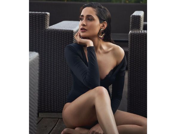 Actress Pragya Jaiswal Stunning Stills In Black Bikini