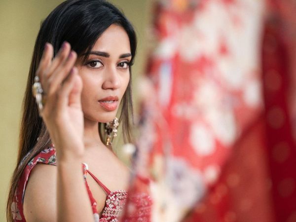 Actress Nivetha Pethuraj Beautiful Stills In Red Lehenga