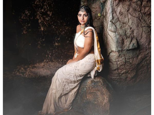 Actress Ananya Nagalla Glamorous Stills In Wet White Saree