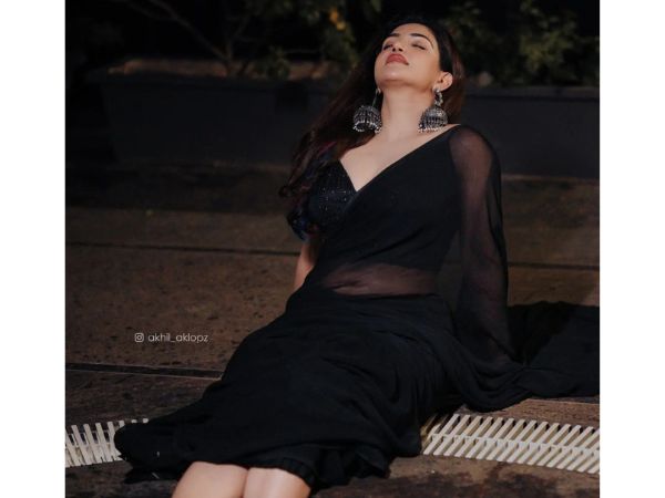 Actress Honey Rose Glamorous Stills In Black Saree