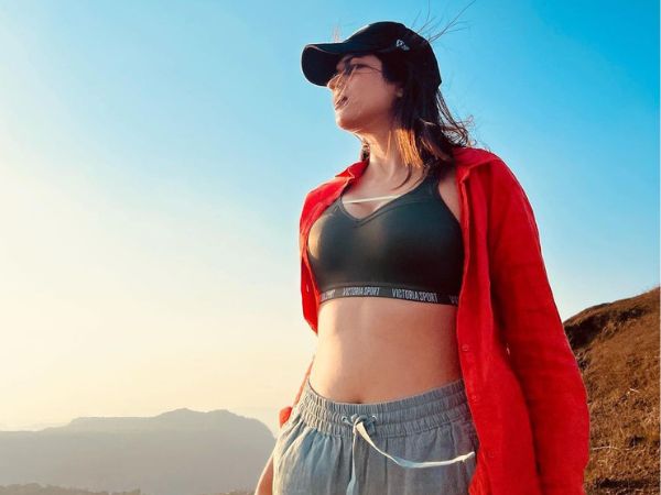 Actress Shraddha Das Glamorous Stills In Trendy Outfit