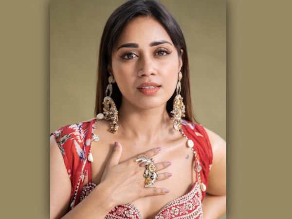 Actress Nivetha Pethuraj Beautiful Stills In Red Lehenga