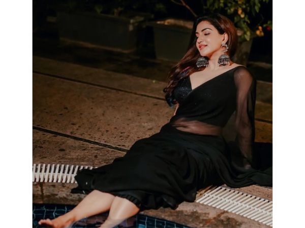 Actress Honey Rose Glamorous Stills In Black Saree