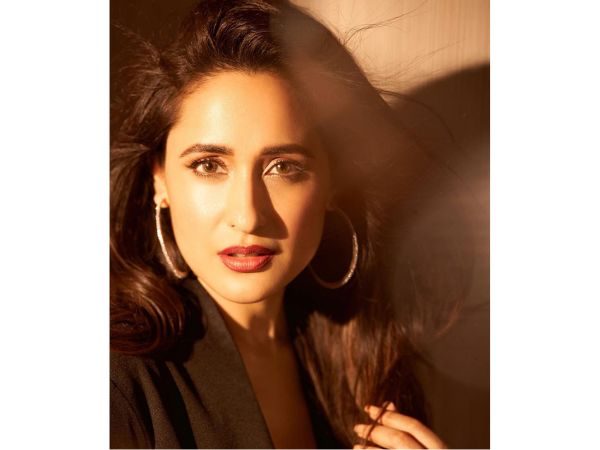 Actress Pragya Jaiswal Mesmerizing Stills in Black Top And Jeans