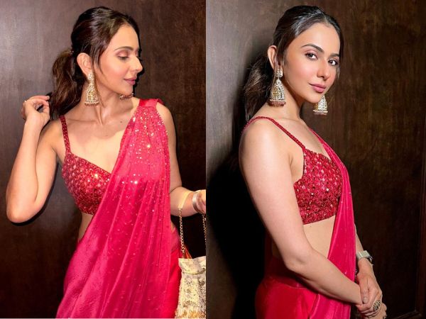 Actress Rakul Preet Singh Mesmerizing Stills in Red Color Saree