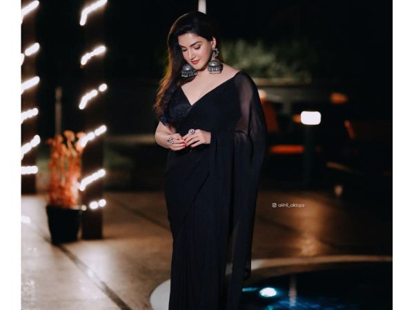 Actress Honey Rose Glamorous Stills In Black Saree