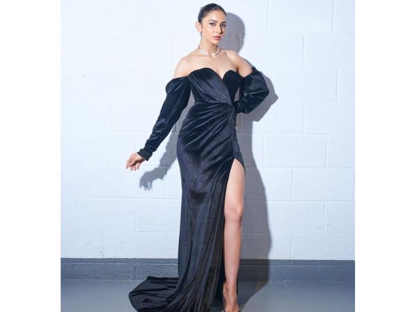 Actress Rakul Preet Singh Ravishing Stills In Black High Slit Dress