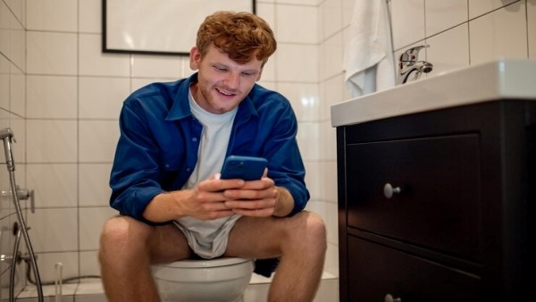 Why Men Spend So Much Time In The Toilet