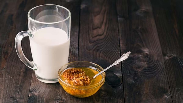 What are benefits and side effects of drinking milk with honey