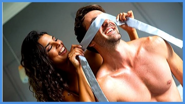 The wife tied her husband to the bed in the bedroom