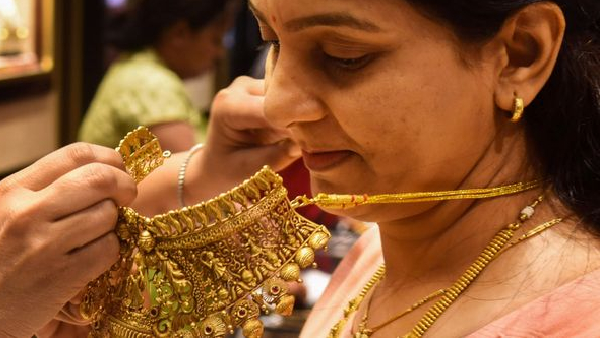 good news to silver and gold lovers prices dropped in hyderabad and vizayawada check today 18 march 2025 rates