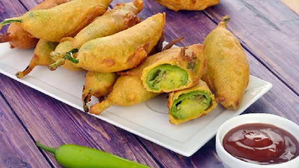 Bored of Regular Bajji Twist it with Aloo Stuffed Mirchi Vada Recipe in Telugu