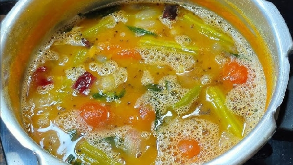 Bored of Routine Tomato Rasam Try this Flavorful Drumstick Rasam Recipe in Telugu