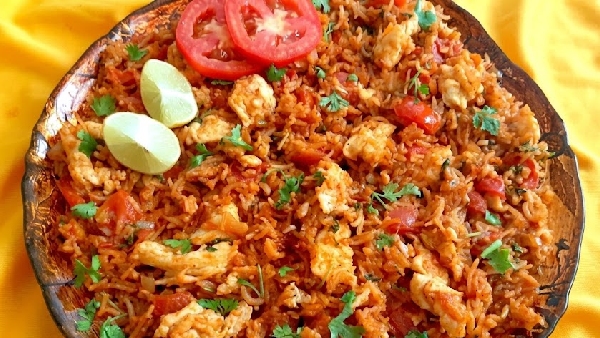 Tired of Regular Egg Rice Try This Spicy Tomato Garlic Egg Fried Rice Recipe in Telugu
