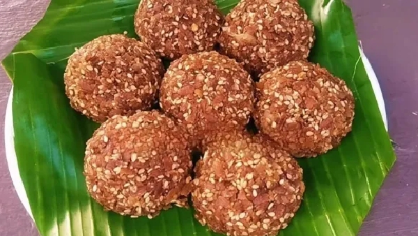 Quick Easy and Healthy How to Make Atukulu Nuvvula Laddu Recipe at Home for Krishnashtami Quick Easy and Healthy How to Make Atukulu Nuvvula Laddu Recipe at Home for Krishnashtami